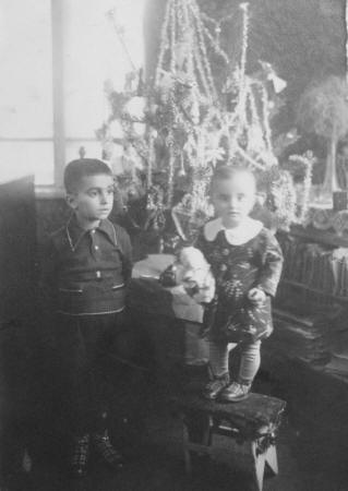 Nikolay and his sister at Christmas