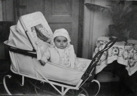 Baby Nikolay in a carriage